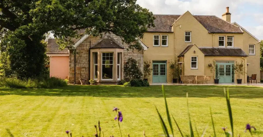 Yoga, Meditation and Healing summer solstice retreat in Scotland at Ladyburn House, featuring expansive private grounds and luxury wellness marquee.